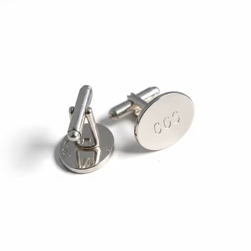 ovala manschettknappar med gravyr