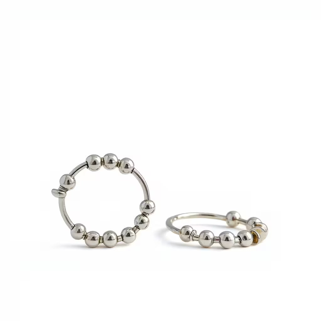 handgjord stressring i äkta silver med kulor att pilla på. Ångestdämpande och lugnande.